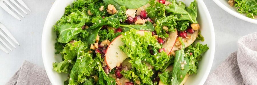 Kale Pomegranate Salad with Chopped Walnuts and Sliced Apples
