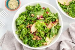 Kale Pomegranate Salad with Chopped Walnuts and Sliced Apples